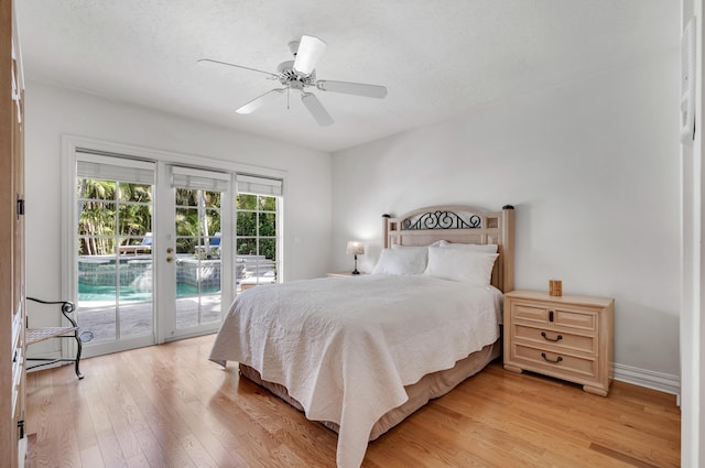 bedroom with a textured ceiling, access to outside, ceiling fan, and light wood-type flooring