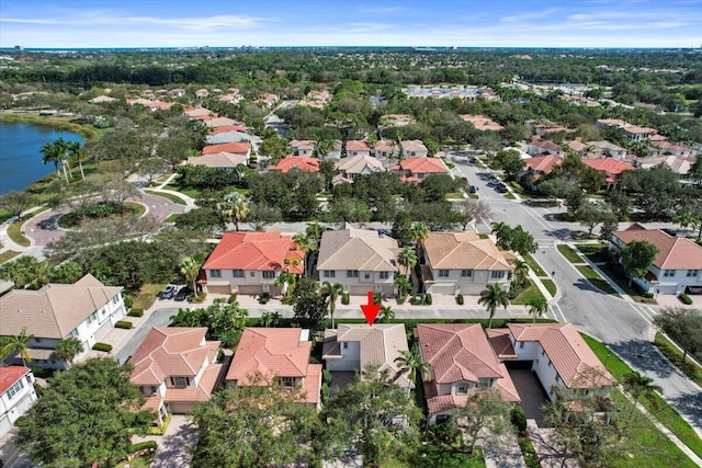 318 September St, Palm Beach Gardens, FL 33410 - aerial view of property and surrounding area featuring nearby suburban area and a large body of water