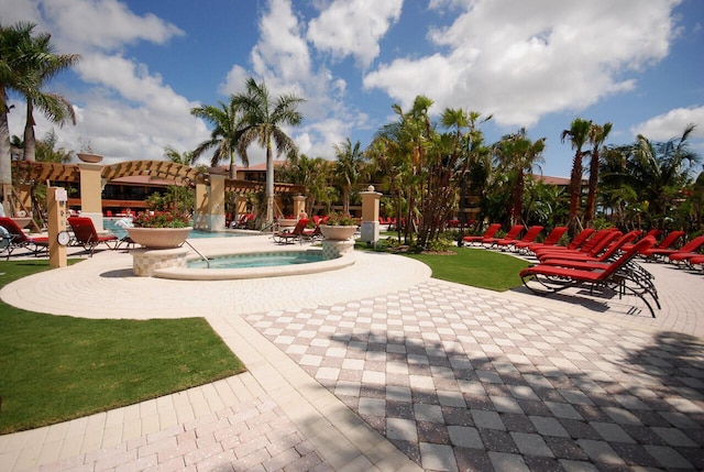 view of home's community with a patio and a jacuzzi