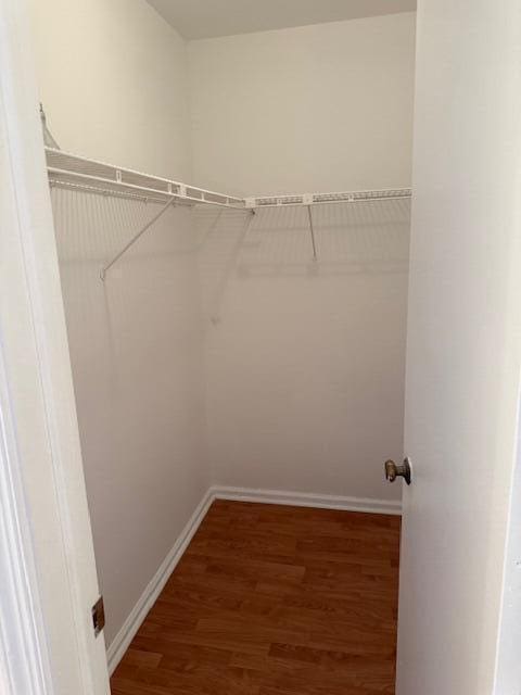 10439 Quailwood Ln Unit B, Boynton Beach, FL 33436 - spacious closet featuring wood finished floors
