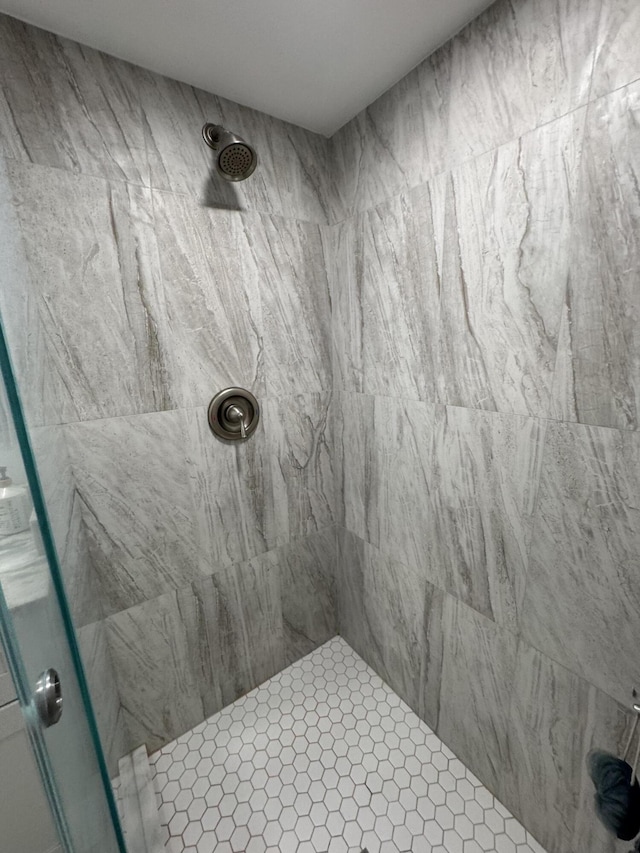 bathroom featuring a stall shower