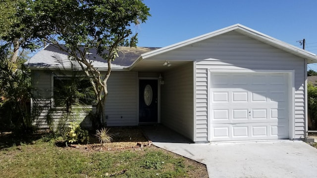 ranch-style home with a garage