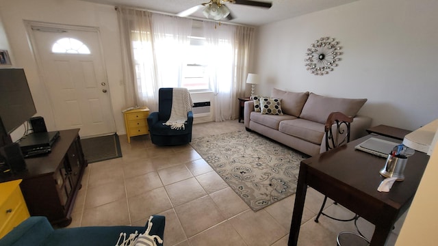 tiled living room featuring ceiling fan