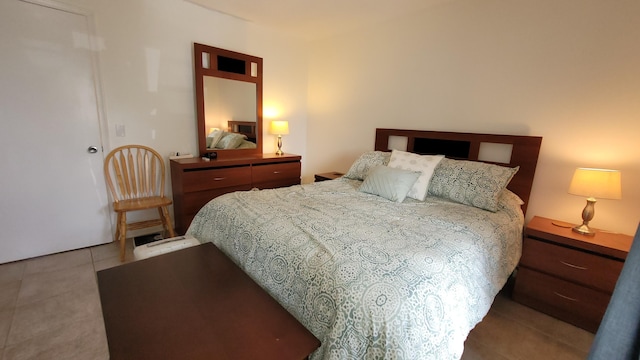 bedroom featuring tile patterned floors