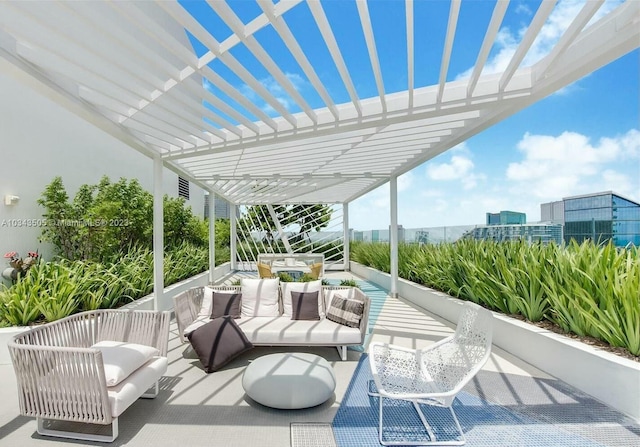 view of patio with an outdoor living space and a pergola