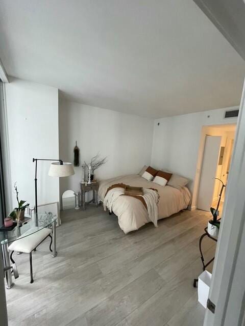 bedroom with light hardwood / wood-style flooring