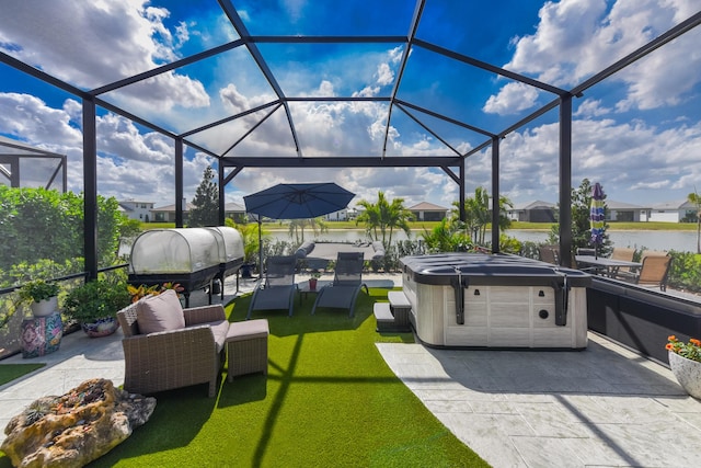 view of patio / terrace with a hot tub, a water view, a lanai, and a residential view