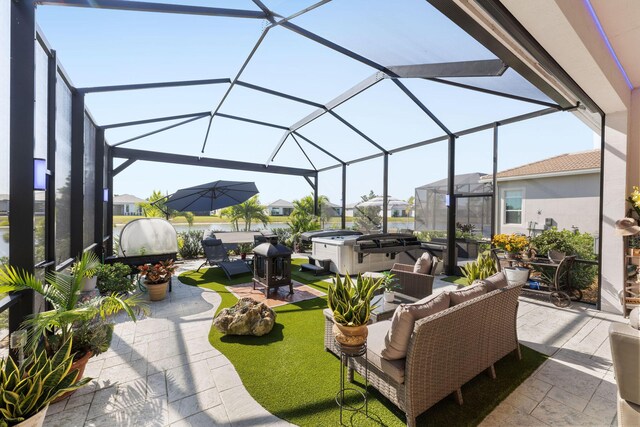 view of patio featuring an outdoor living space, a hot tub, a lanai, and a residential view