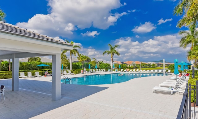 community pool featuring a patio