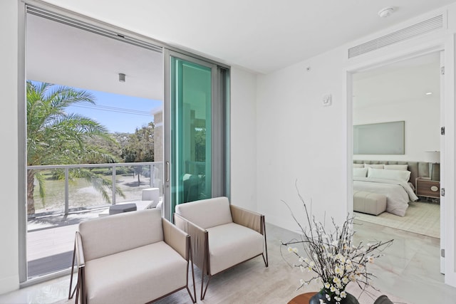 living area with expansive windows