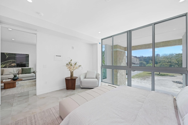 bedroom with a wall of windows