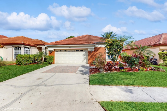 mediterranean / spanish-style home featuring a garage and a front lawn