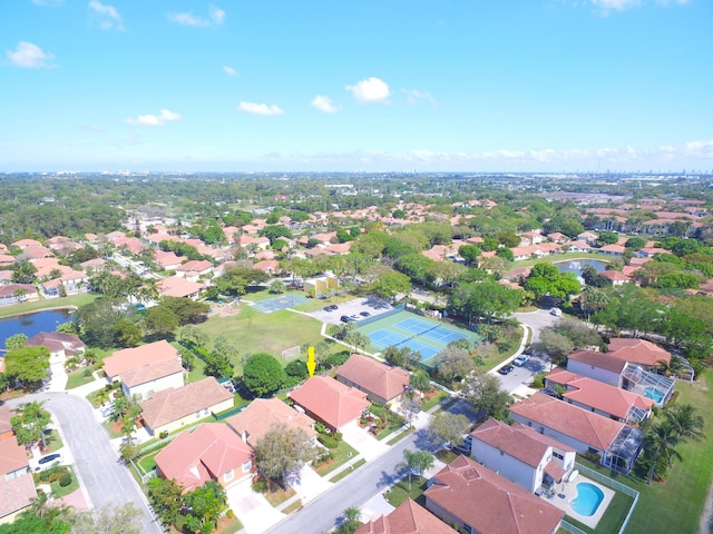 bird's eye view featuring a residential view and a water view