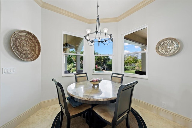 dining room featuring crown molding and a notable chandelier