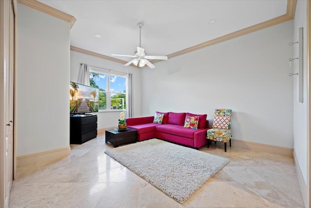 living room with ornamental molding and ceiling fan