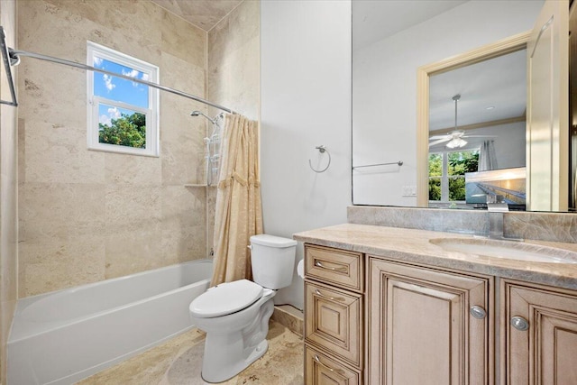 full bathroom with vanity, toilet, shower / bath combo with shower curtain, and a wealth of natural light