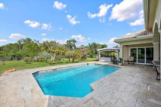 view of pool with a gazebo, a patio area, and a lawn