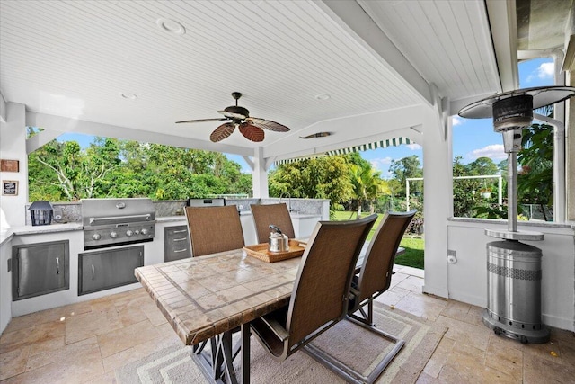 view of patio / terrace featuring ceiling fan, area for grilling, and grilling area