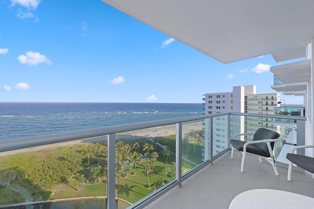 balcony featuring a water view