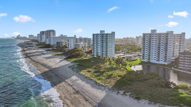 aerial view featuring a water view and a beach view