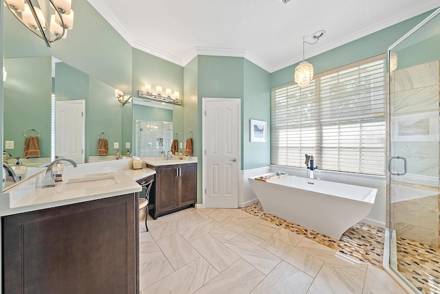 bathroom with shower with separate bathtub, ornamental molding, and vanity