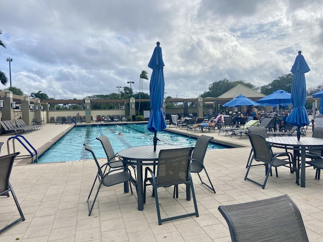 2201 Lucaya Bnd Unit M1, Coconut Creek, FL 33066 - community pool with a patio area