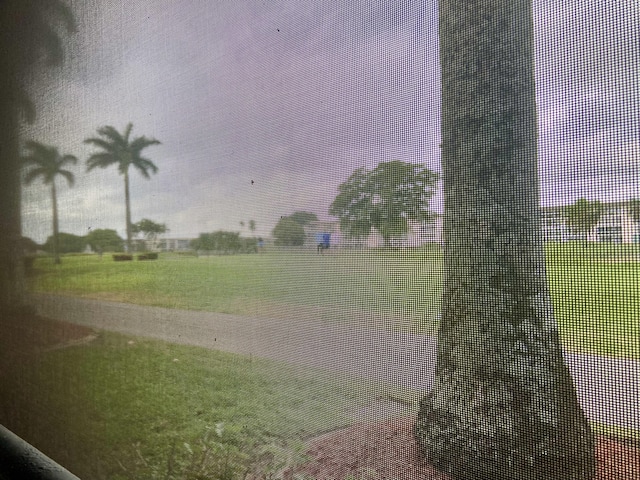 2201 Lucaya Bnd Unit M1, Coconut Creek, FL 33066 - view of home's community featuring a yard