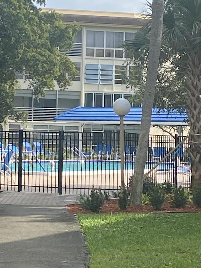 2201 Lucaya Bnd Unit M1, Coconut Creek, FL 33066 - pool with fence