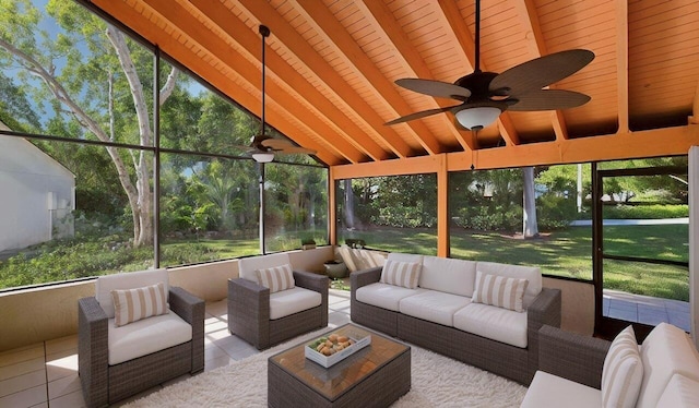sunroom featuring an outdoor hangout area, ceiling fan, and beam ceiling