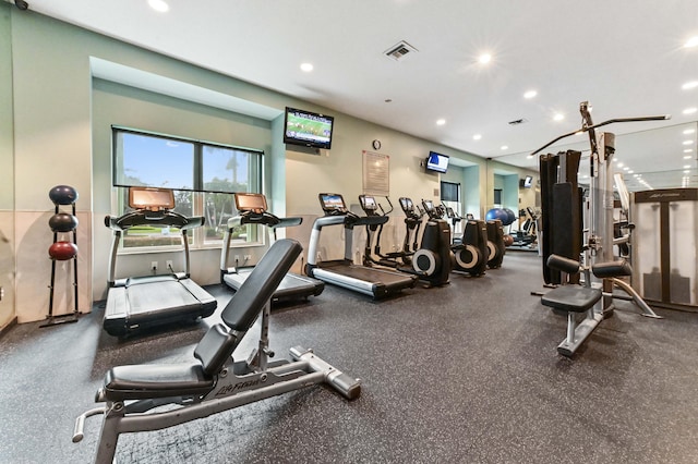 workout area with visible vents and recessed lighting