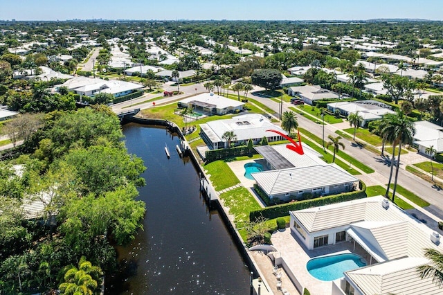 aerial view featuring a residential view and a water view