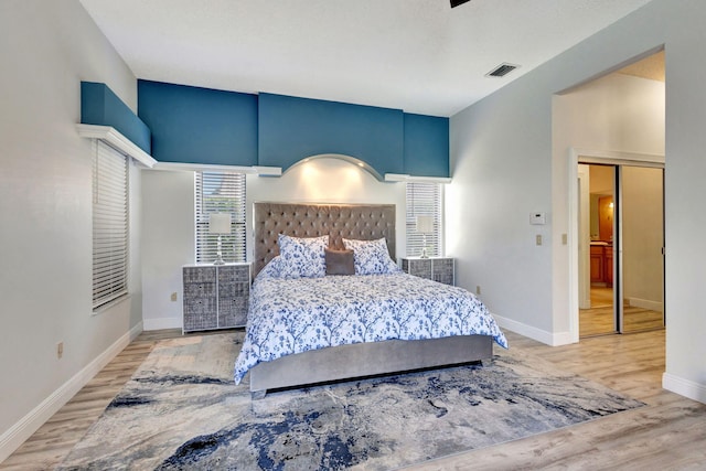 bedroom with light hardwood / wood-style flooring