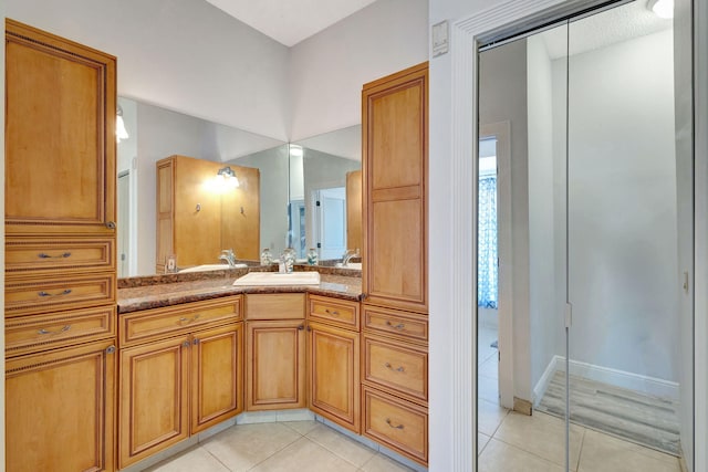 bathroom featuring vanity and tile patterned floors