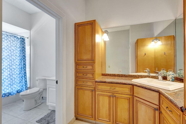 full bathroom with shower / bath combination with curtain, vanity, toilet, and tile patterned flooring