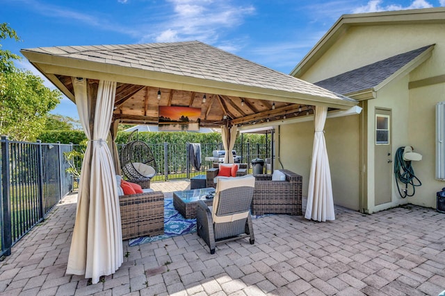 view of patio / terrace featuring a gazebo and an outdoor hangout area