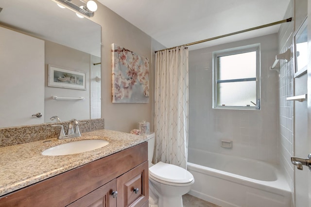 full bath featuring shower / tub combo, vanity, and toilet