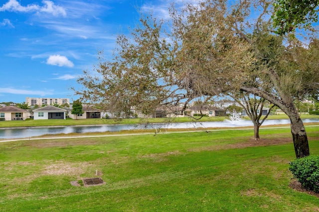 view of yard with a water view