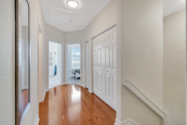 corridor featuring light hardwood / wood-style flooring