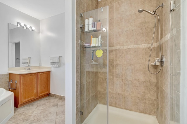 bathroom featuring vanity, an enclosed shower, and tile patterned flooring