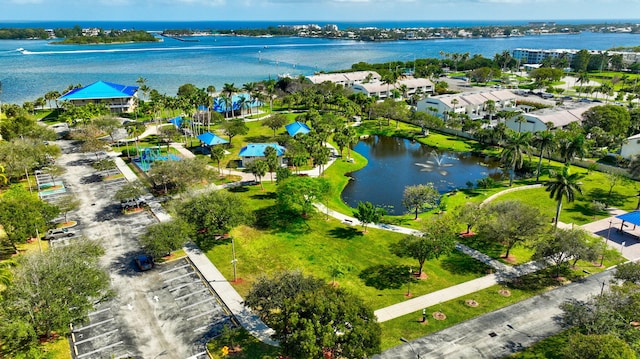 birds eye view of property featuring a water view