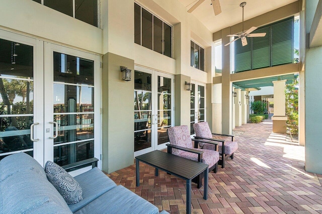 view of patio with ceiling fan and french doors