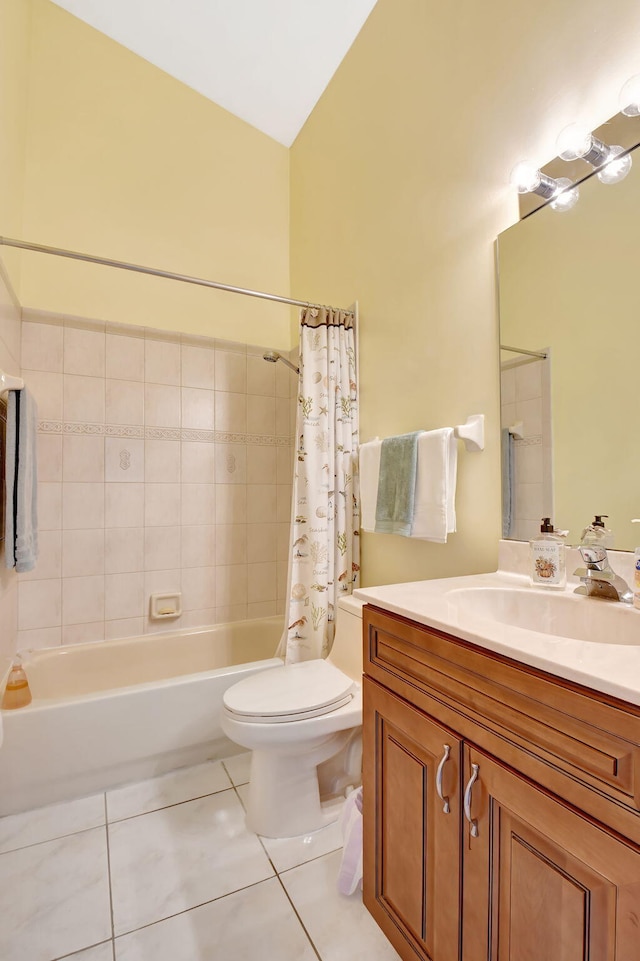 full bathroom featuring tile patterned floors, vanity, shower / tub combo with curtain, and toilet