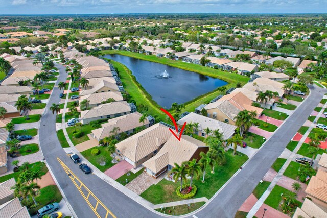 bird's eye view with a water view