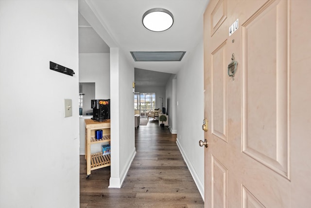 foyer entrance with dark wood-type flooring