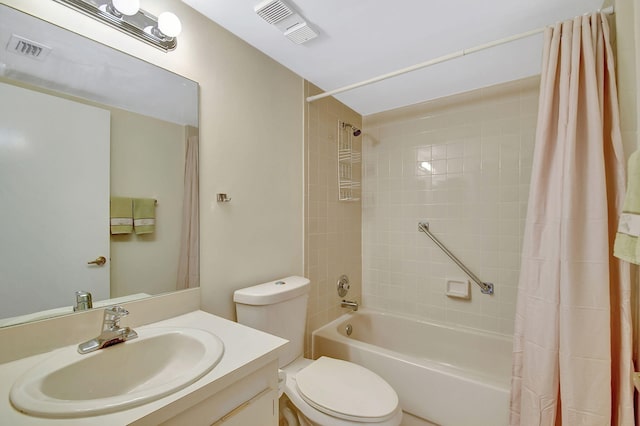 full bathroom featuring shower / bath combination with curtain, vanity, and toilet