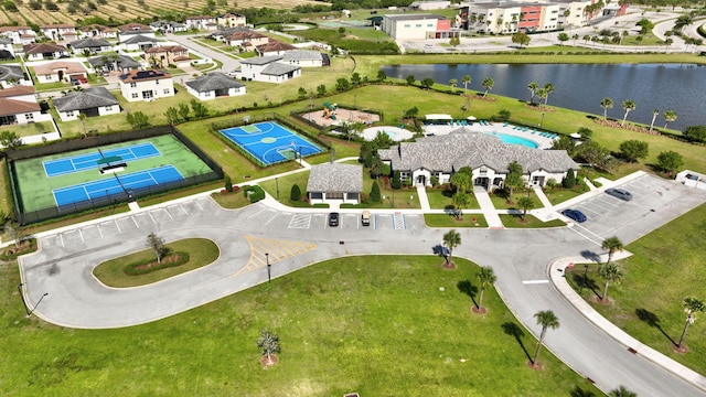 aerial view with a water view and a residential view