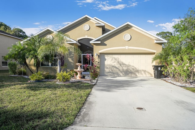 view of front facade featuring a garage and a front yard