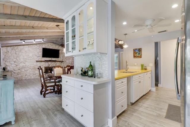 10174 Dogwood Ave, Palm Beach Gardens, FL 33410 - kitchen with light wood finished floors, a ceiling fan, a sink, wooden ceiling, and glass insert cabinets