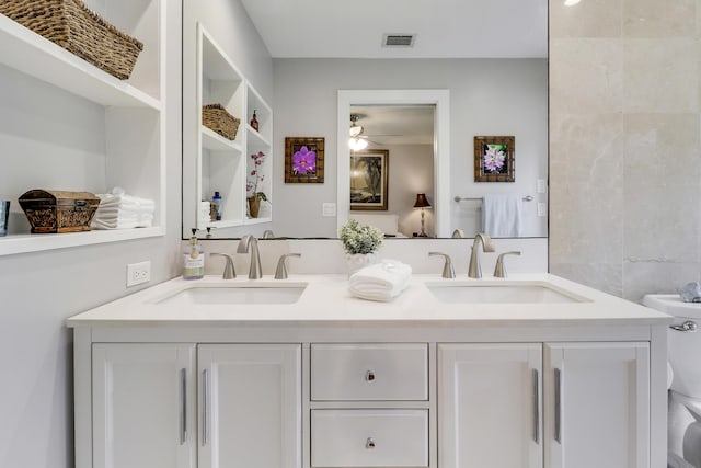 10174 Dogwood Ave, Palm Beach Gardens, FL 33410 - full bath featuring a ceiling fan and double vanity