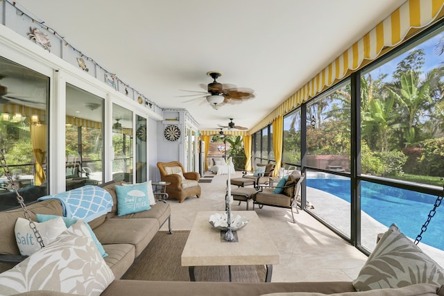 10174 Dogwood Ave, Palm Beach Gardens, FL 33410 - sunroom / solarium with ceiling fan, outdoor lounge area, and plenty of natural light